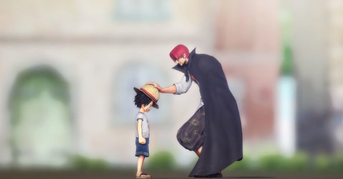 ルフィの頭にシャンクスが麦わら帽子を乗せている