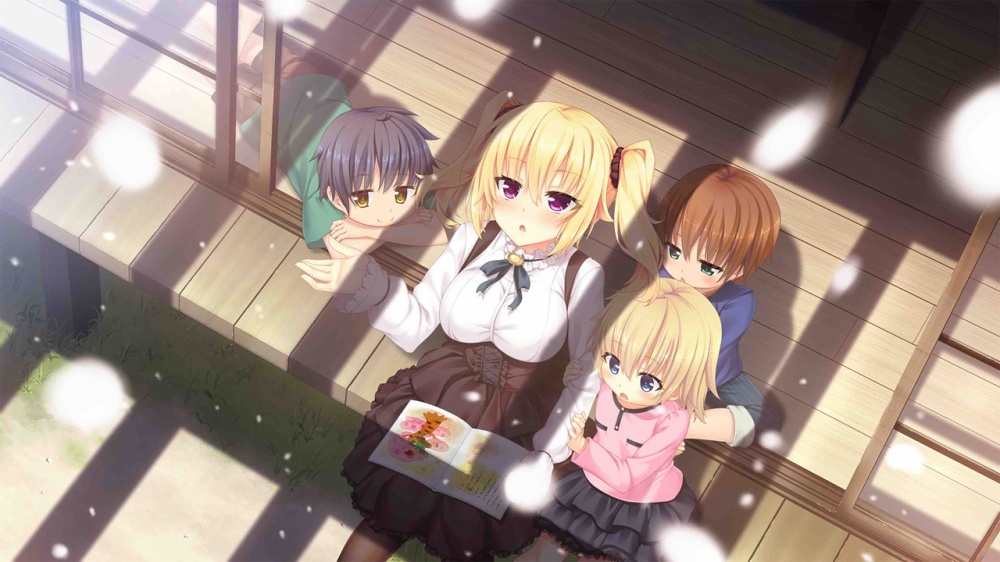 金髪の女の子と子供3人が座っている
