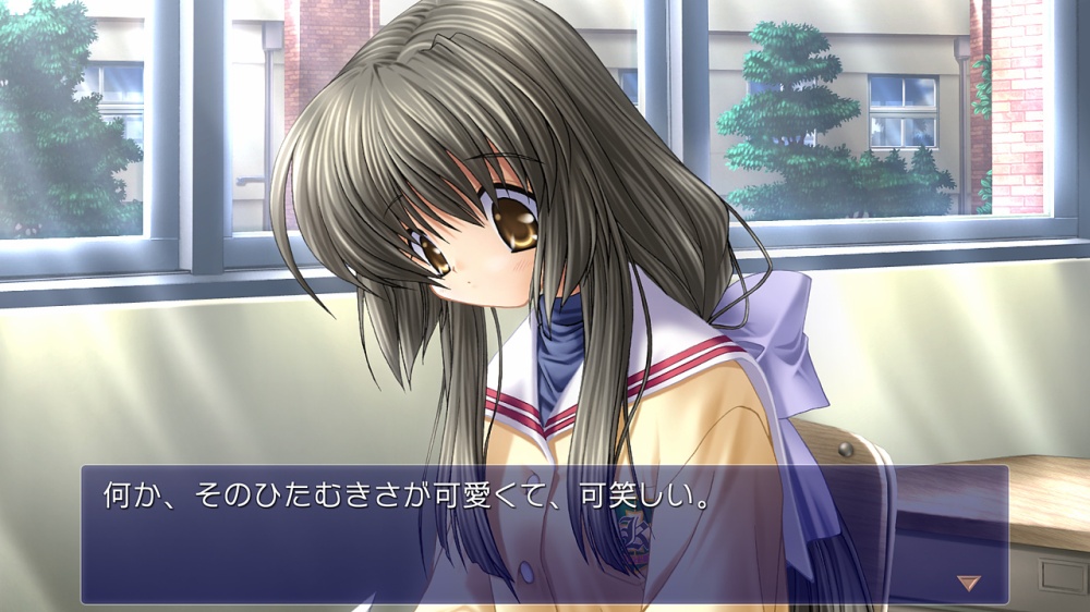 制服姿の少女が下を向いている